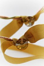 swarovski gold ribbon