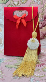 Sunflower ornament made of porcelain with gold tassel - Image 3