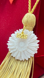 Sunflower ornament made of porcelain with gold tassel