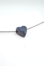 Silver necklace with blue heart and black chain - Image 2