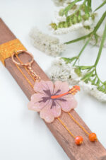 Bronze easter candle with plexiglass keychain pink hibiscus