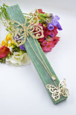 Easter green candle with gold plexiglass butterfly