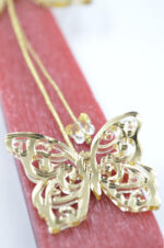Easter red candle with gold plexiglass butterfly - Image 4