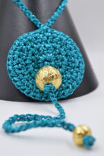Handmade crochet turquoise necklace with gold plated ceramic elements - Image 5