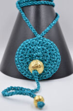 Handmade crochet turquoise necklace with gold plated ceramic elements