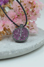 Pomegranate necklace black plated with pink zircons