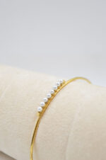 Bracelet made of 925° sterling silver gold plated and freshwater pearls