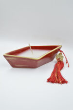 Venetian red ceramic boat candle with clover 2025