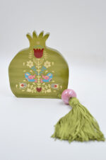 Tabletop green plexiglass pomegranate 2025 with pink bead