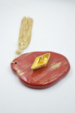 Venetian red presse papier with gold boat