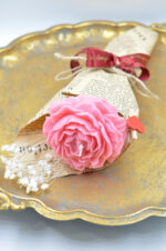 Handmade scented soy candle peony in a bouquet
