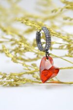 Black plated earrings with red Swarovski heart