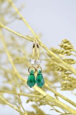 Gold plated earrings with green Swarovski