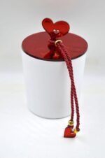 Candle in a white jar with a plexiglass heart lid Love