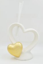 Decorative room fragrance with a golden heart
